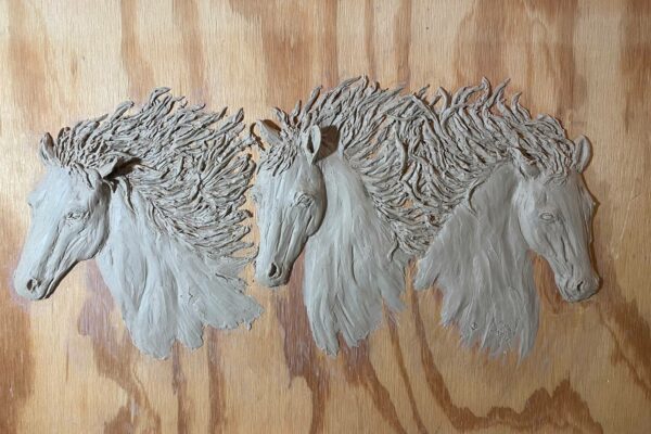 Hooves-One-Heart-In-Progress-Pic-of-Clay-Relief-Design-Prior-to-Bronze